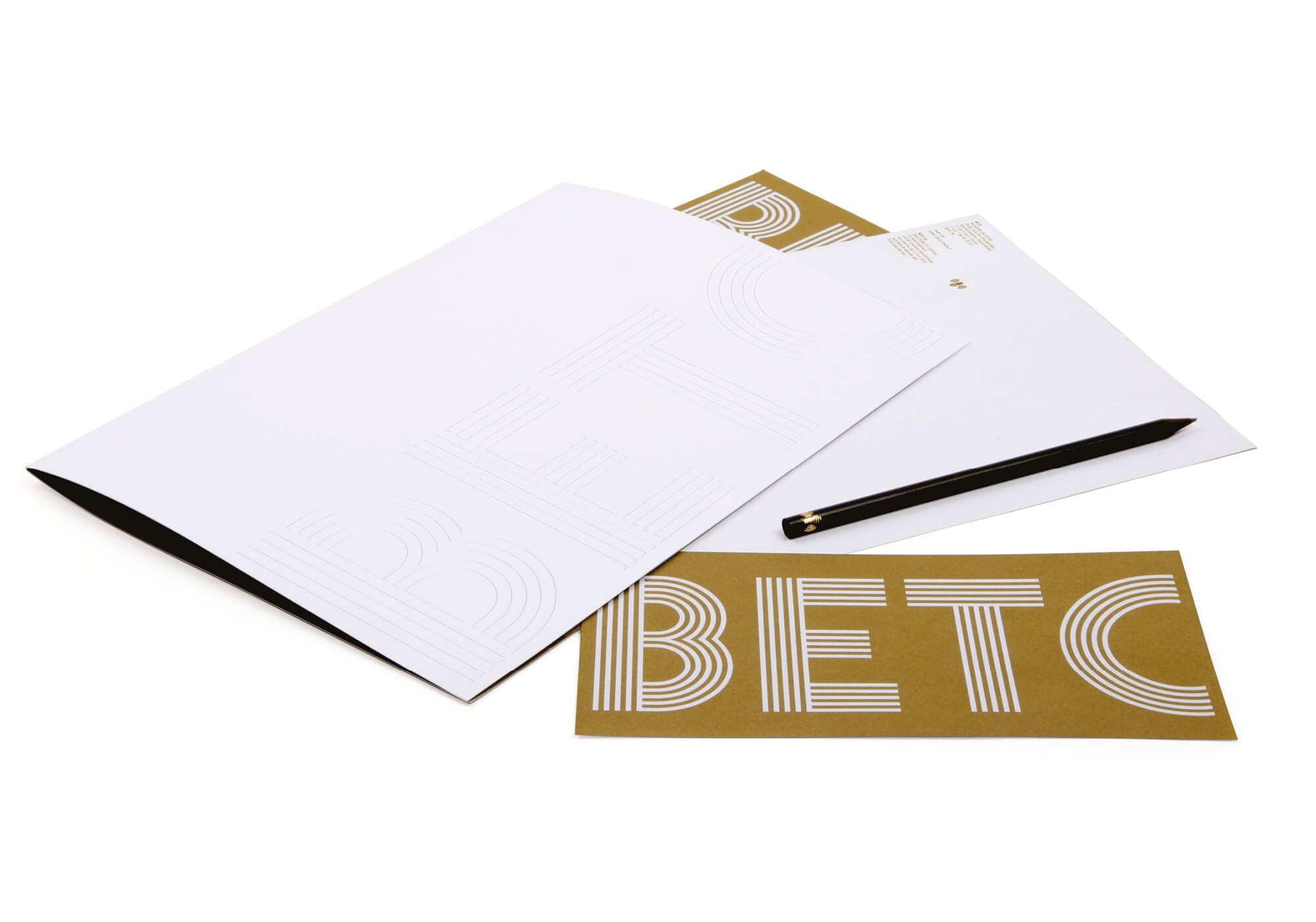 Pochette, papier en tête et carte de correspondance de l'agence de publicité BETC, gaufrage et or, design IchetKar