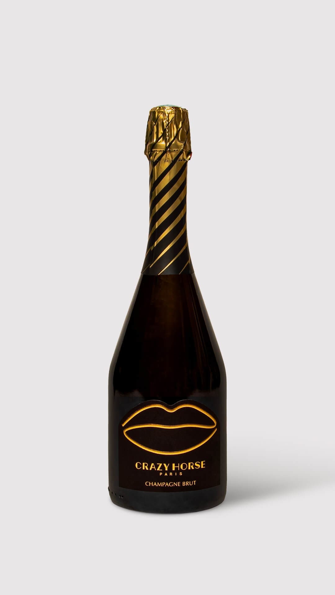 La nouvelle bouteille de champagne du crazy horse Paris, bouche doré pour le champagne brut, design IchetKar